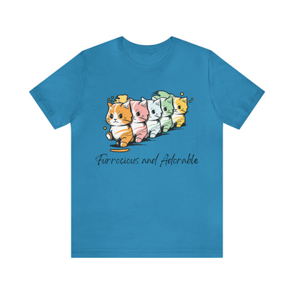 psychedelicBRANDz's Psychedeli-Cute Clawdyssey featuring five cute kittens on an aqua shirt